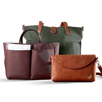 Forest Green Tote Trio shown with three included components; forest green waxed canvas tote with brown vegan leather accents, brown vegan leather diaper clutch and burgundy multi-pocket organizer insert with carry handles.