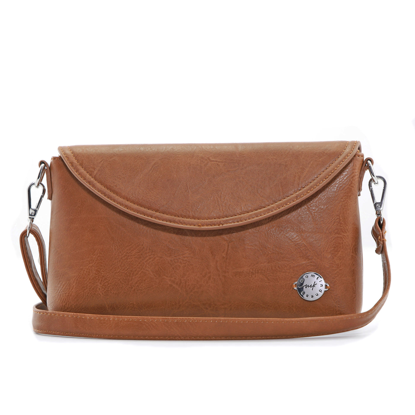 Caramel brown vegan leather clutch with removable crossbody strap on white background.
