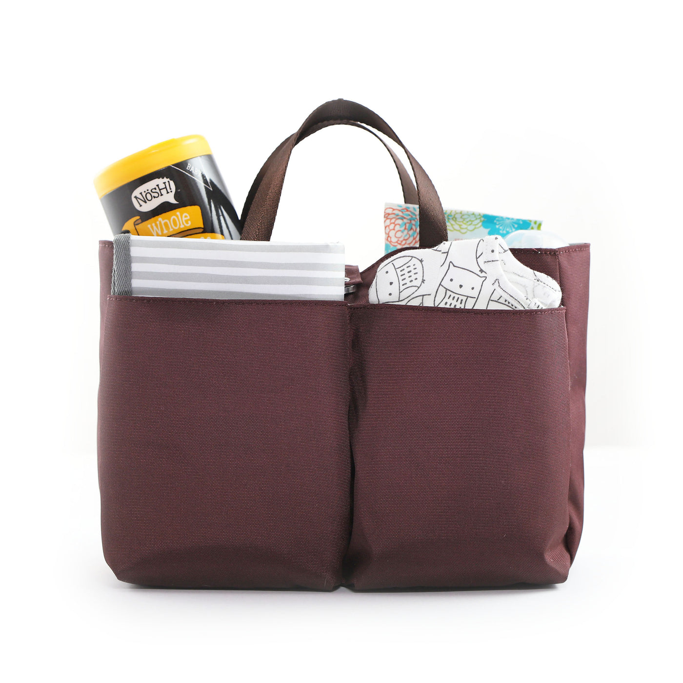 Burgundy organizer bag with 2 carry handles, shown packed with baby items, diapers, changing mat and snack container.