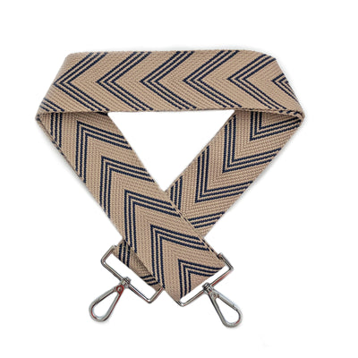 A navy blue and tan chevron patterned woven bag strap with silver metal buckles, shown laying on a plain white background.