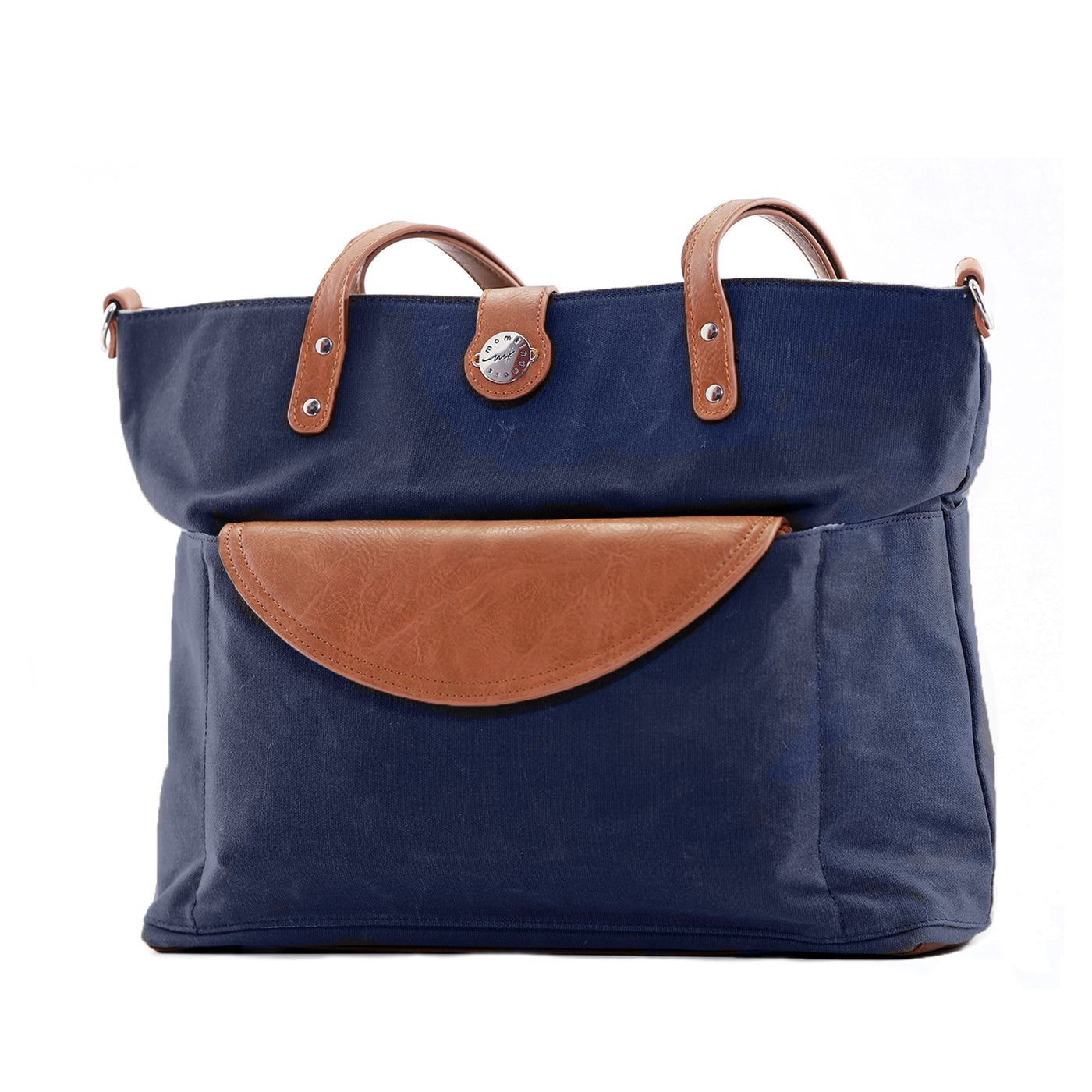Navy waxed canvas tote with brown vegan leather accents and clutch tucked in front pocket, shown on white background.