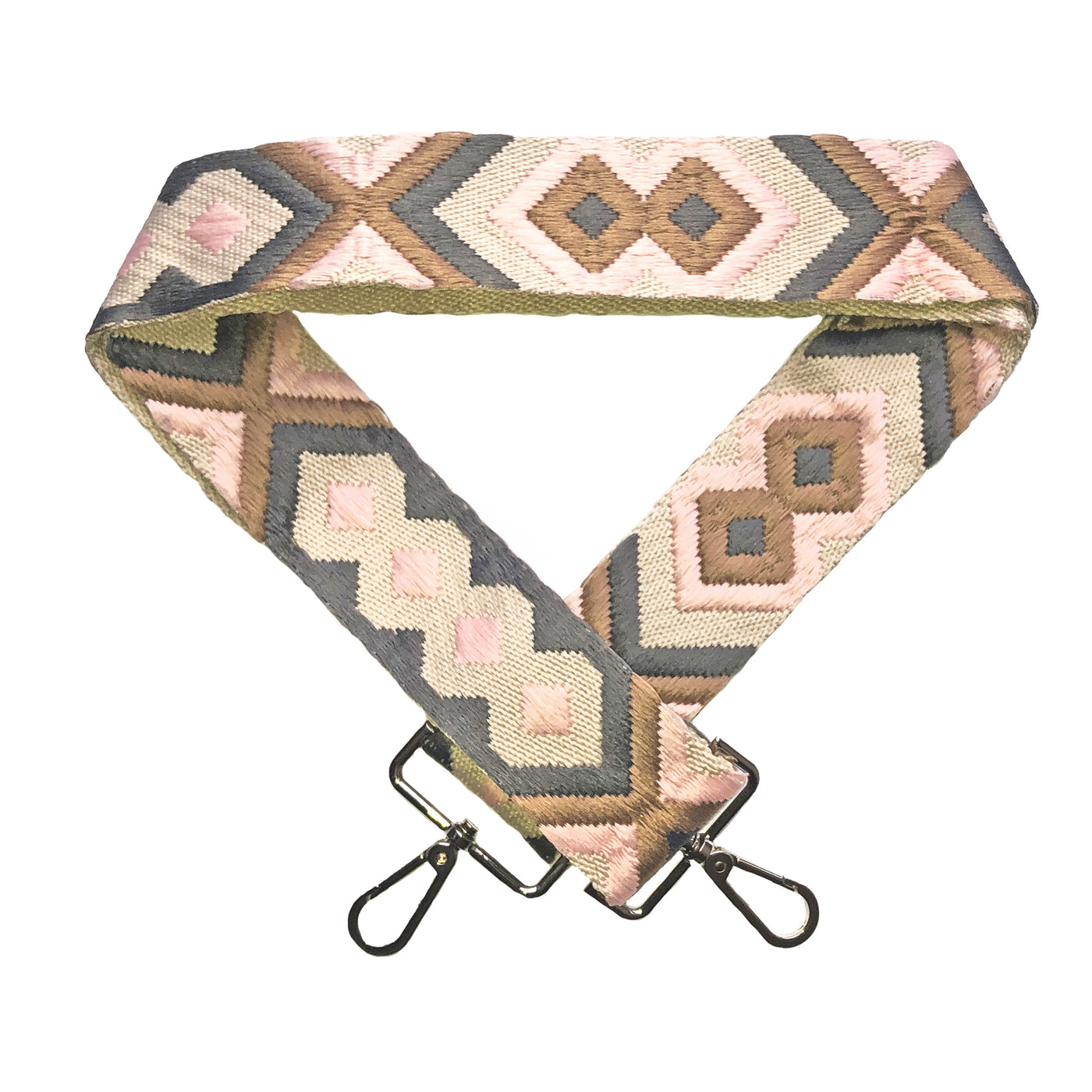 A grey, pink, brown and beige geometric patterned woven messenger strap with sliver-colored buckles, shown laying on a plain white background.