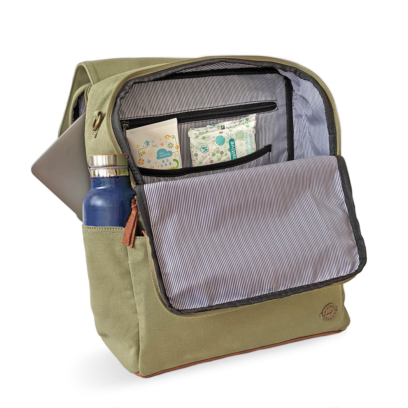 A laurel green colored canvas backpack with caramel brown vegan leather accents, shown in 3/4 front view with the main compartment open to reveal interior pockets and striped lining, also with a water bottle in side pocket.