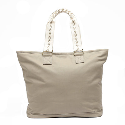 Back side of Rye (Tan) large capacity tote with off-white handles that have a tan accent stitch design on them.